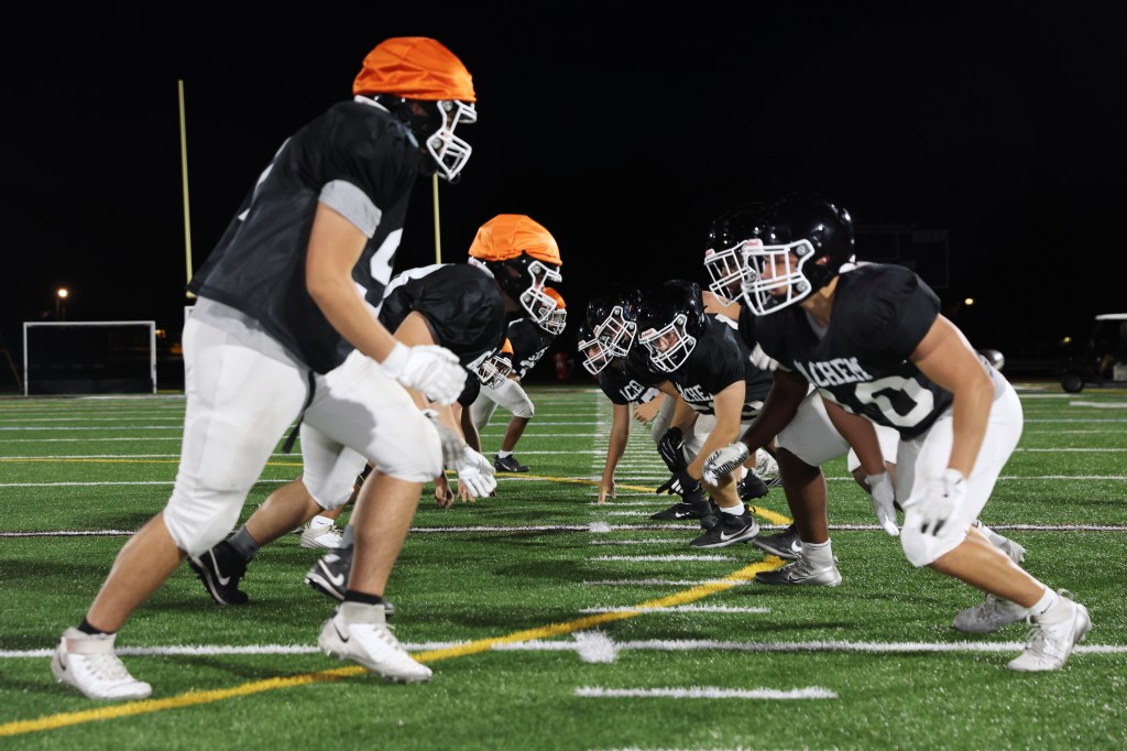 Sachem Norths' offensive and defensive lines run drills during practice on Aug. 27, 2025.