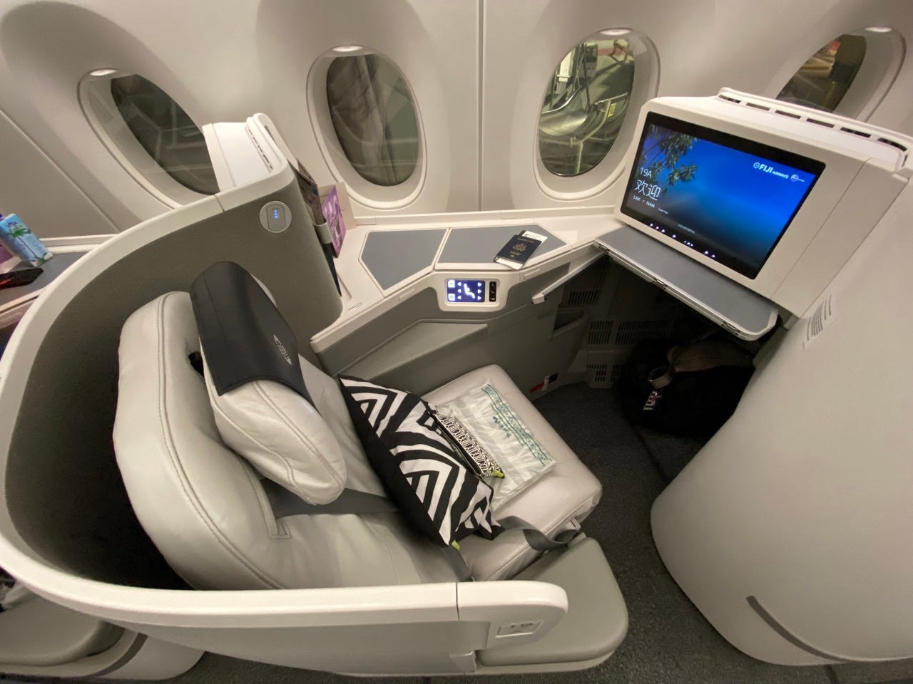 White leather business class seat on Fiji Airlines flight