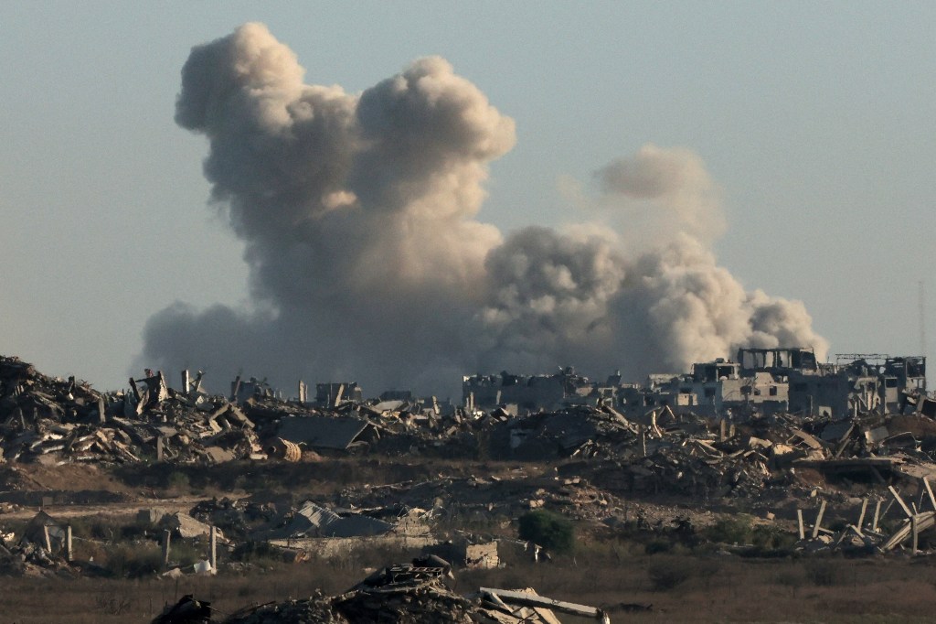 This picture taken from a position near Israel's border with the Gaza Strip shows smoke billowing during an Israeli strike on the besieged Palestinian territory