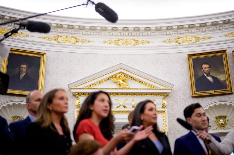 Paintings and gold trim in the Oval Office
