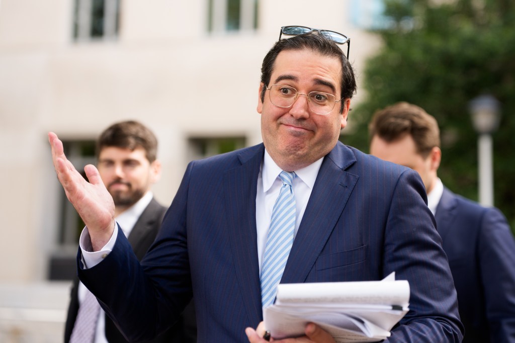 Yaakov Roth, Principal Deputy Assistant Attorney General, speaking outside a courthouse.