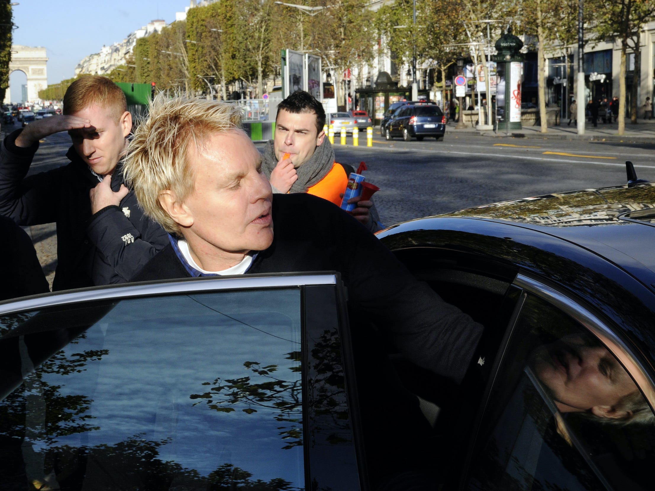 Abercrombie CEO Mike Jeffries gets into black car in Paris