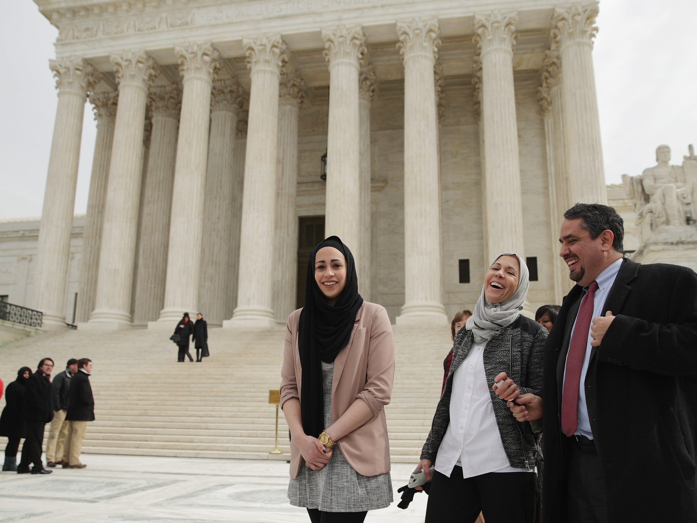 Samantha Elauf stands outside Supreme Court smiling with mother