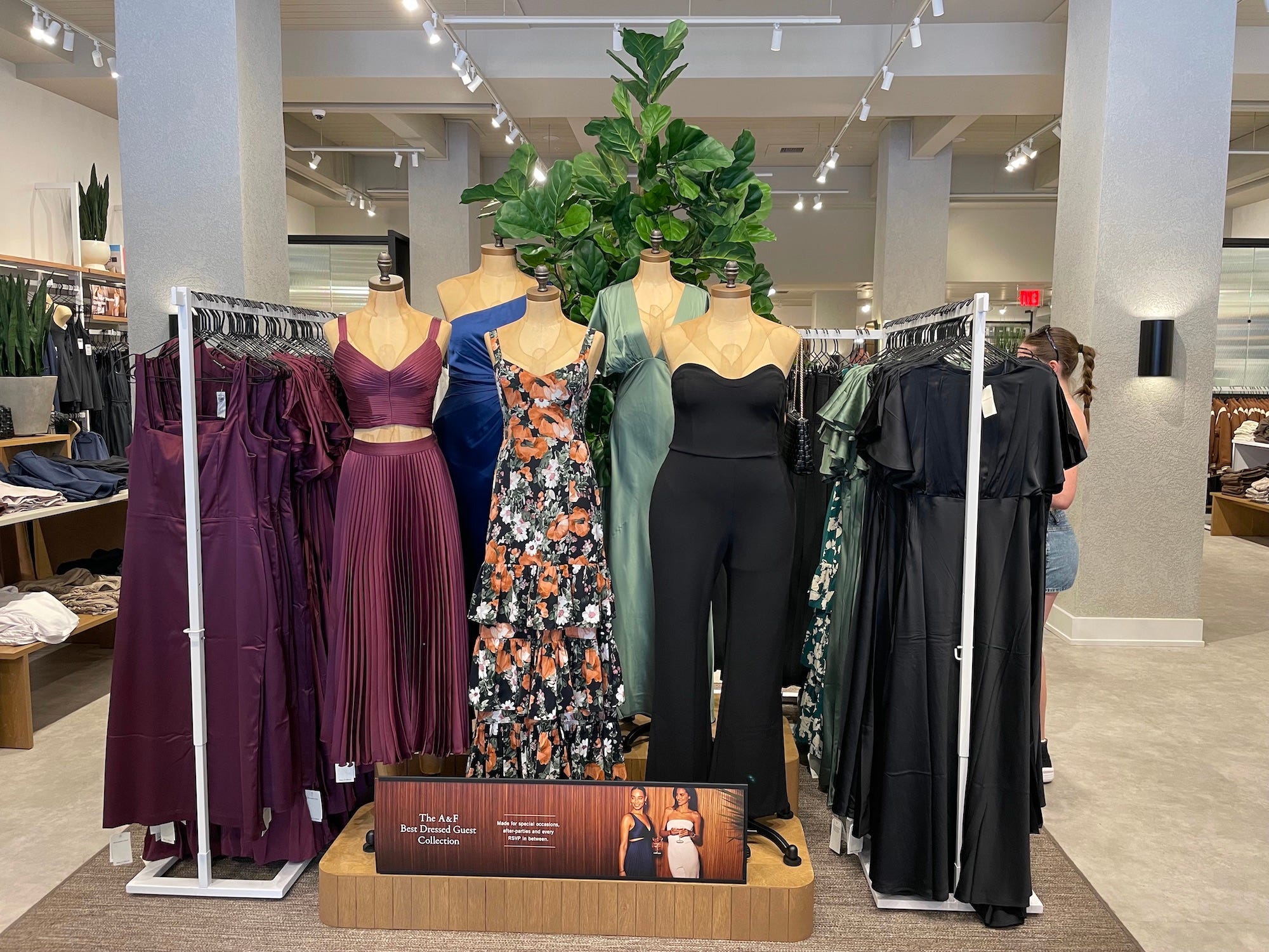dresses are displayed inside abercrombie and fitch fifth avenue store in new york city