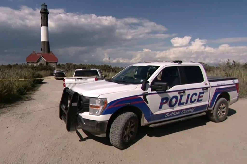 Police car at Fire Island Lighthouse following a death.