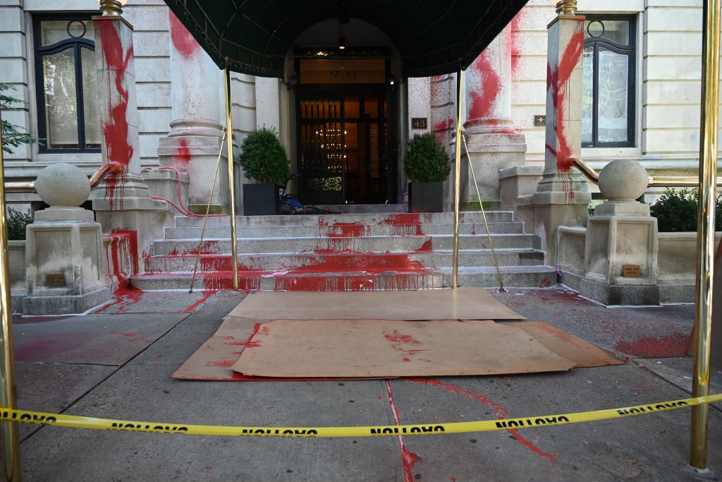 The canopy of 43 Fifth Avenue was streaked in red paint during the overnight attack tied to pro-Palestinian activists.