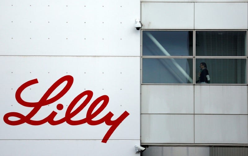 FILE PHOTO: The logo of Lilly is seen on a wall of the Lilly France company unit, part of the Eli Lilly and Co drugmaker group, in Fegersheim near Strasbourg, France, February 1, 2018. Picture taken February 1, 2018. REUTERS/Vincent Kessler
