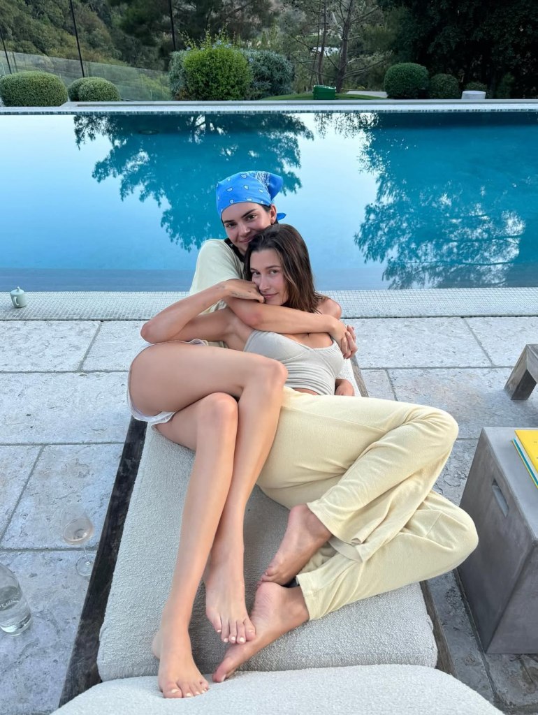 Best buds Kendall Jenner (left) and Hailey Bieber get snuggly.
