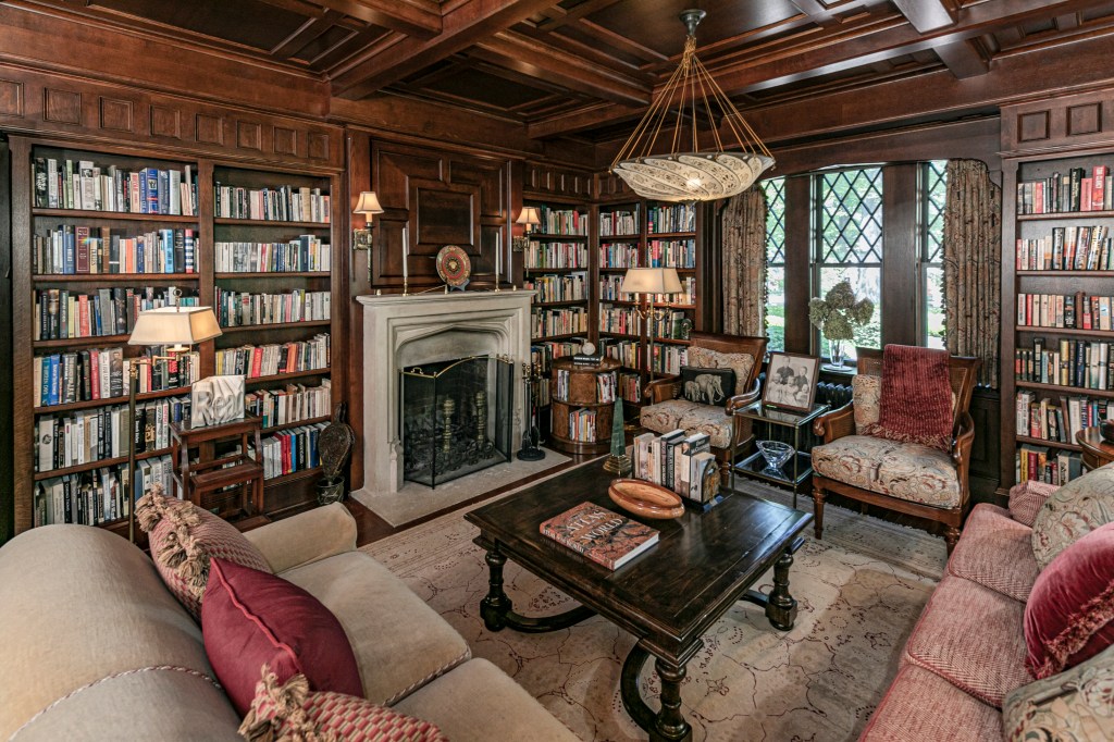 Woodrow Wilson's library, featuring bookshelves, fireplace, and seating.