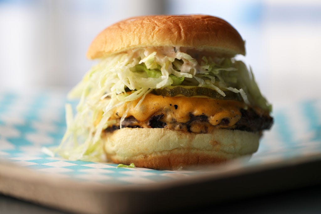 A classic smashburger with lettuce, pickles, and cheese