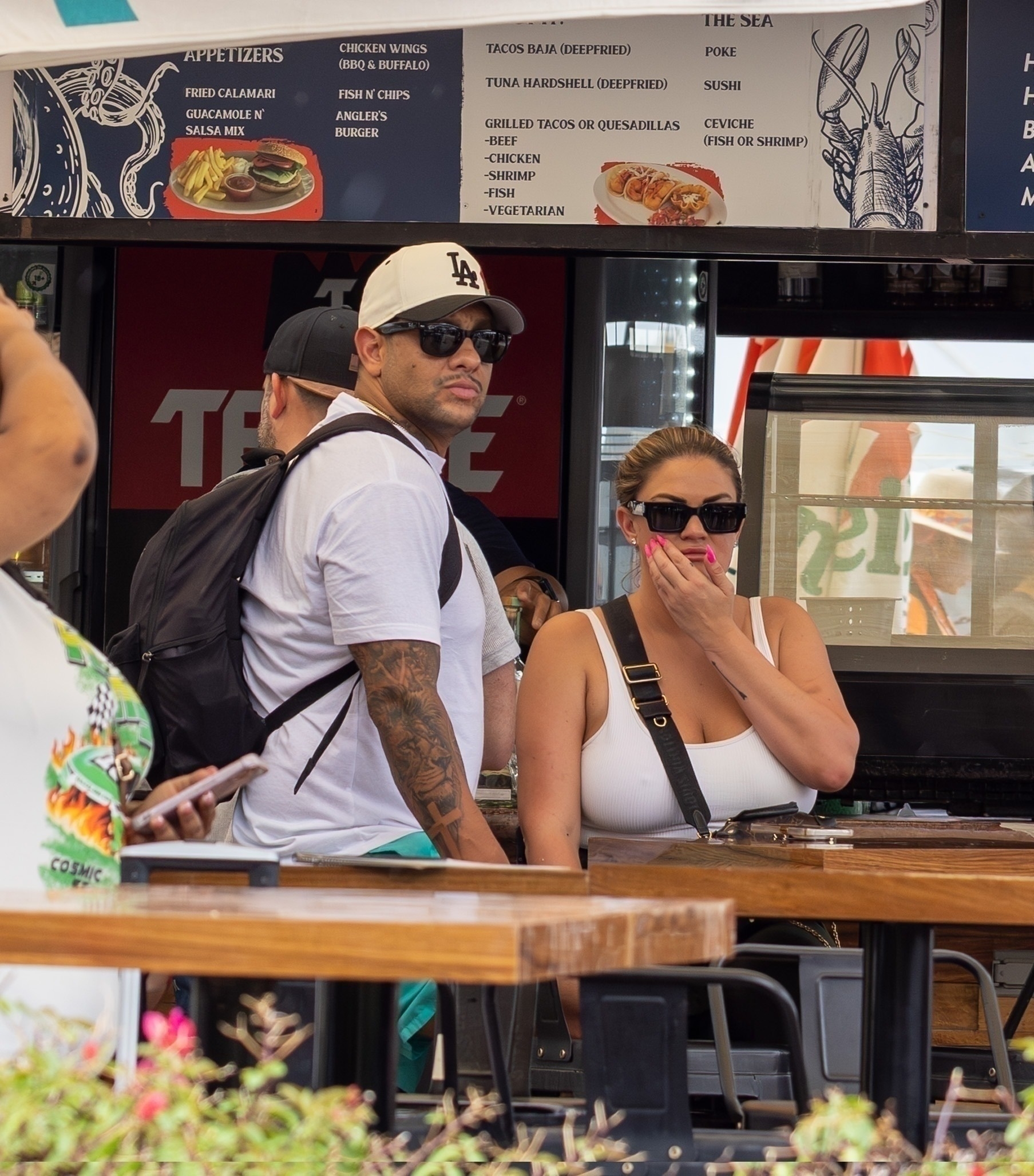 Brittany Cartwright and Brandon Hanson at a taco stand. 