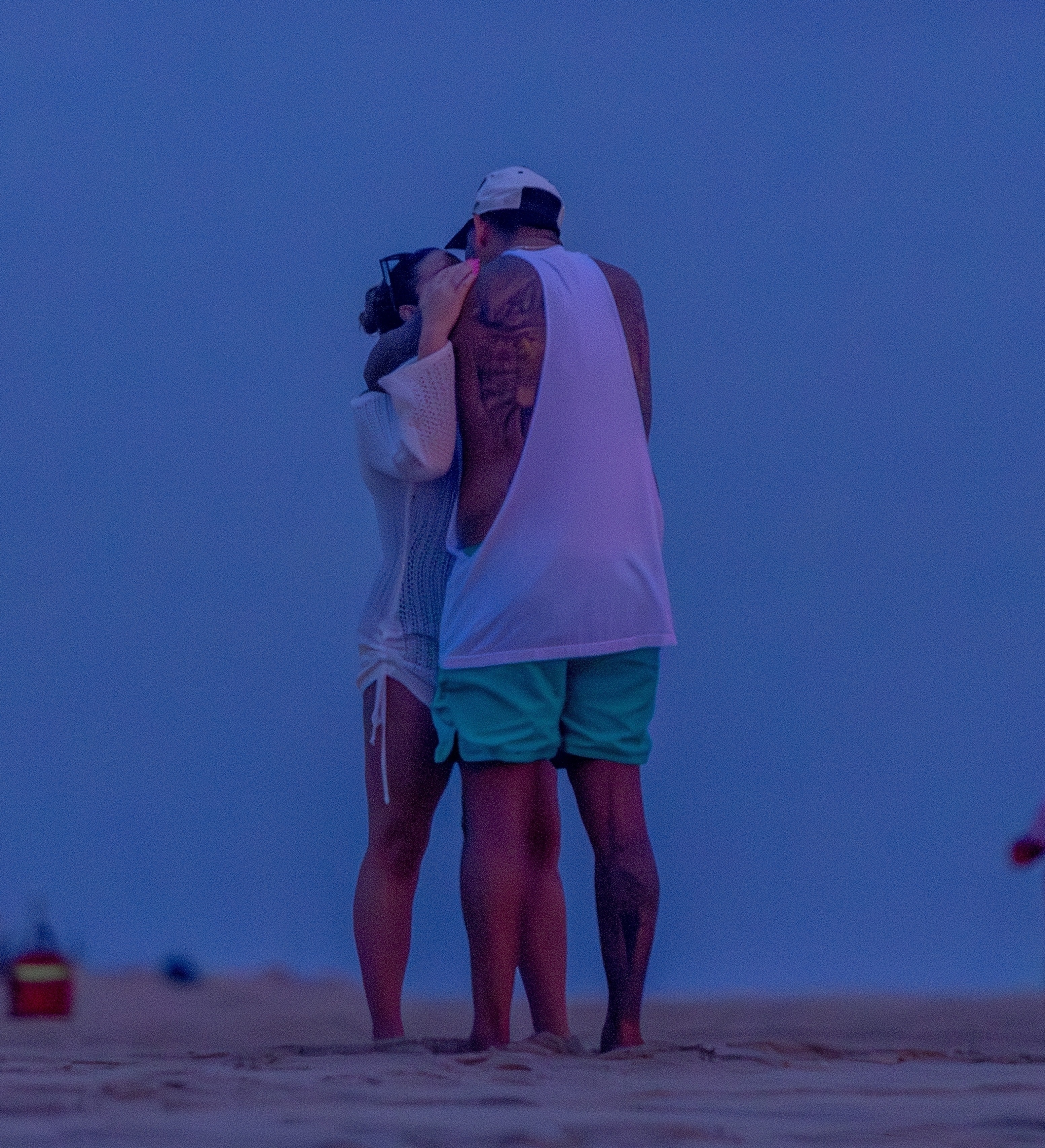 Brittany Cartwright and Brandon Hanson kissing on the beach. 