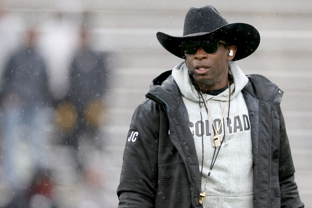 BOULDER, COLORADO - APRIL 27: Head coach Deion Sanders of the Colorado Buffaloes watches as his team plays their spring game at Folsom Field on April 27, 2024 in Boulder, Colorado.  (Photo by Matthew Stockman/Getty Images)
