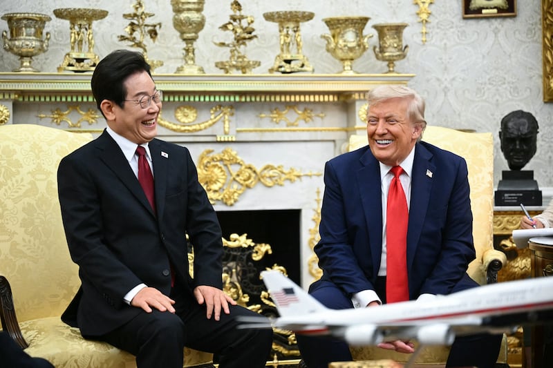 US President Donald Trump and South Korean President Lee Jae Myung attend a bilateral meeting in the Oval Office of the White House in Washington, DC, on August 25, 2025. Trump on Monday suggested that a "purge or revolution" was underway in South Korea, hours before new President Lee Jae Myung was due at the White House. He did not specify to what he was referring but said he would bring it up with Lee. (Photo by Mandel NGAN / AFP) (Photo by MANDEL NGAN/AFP via Getty Images)