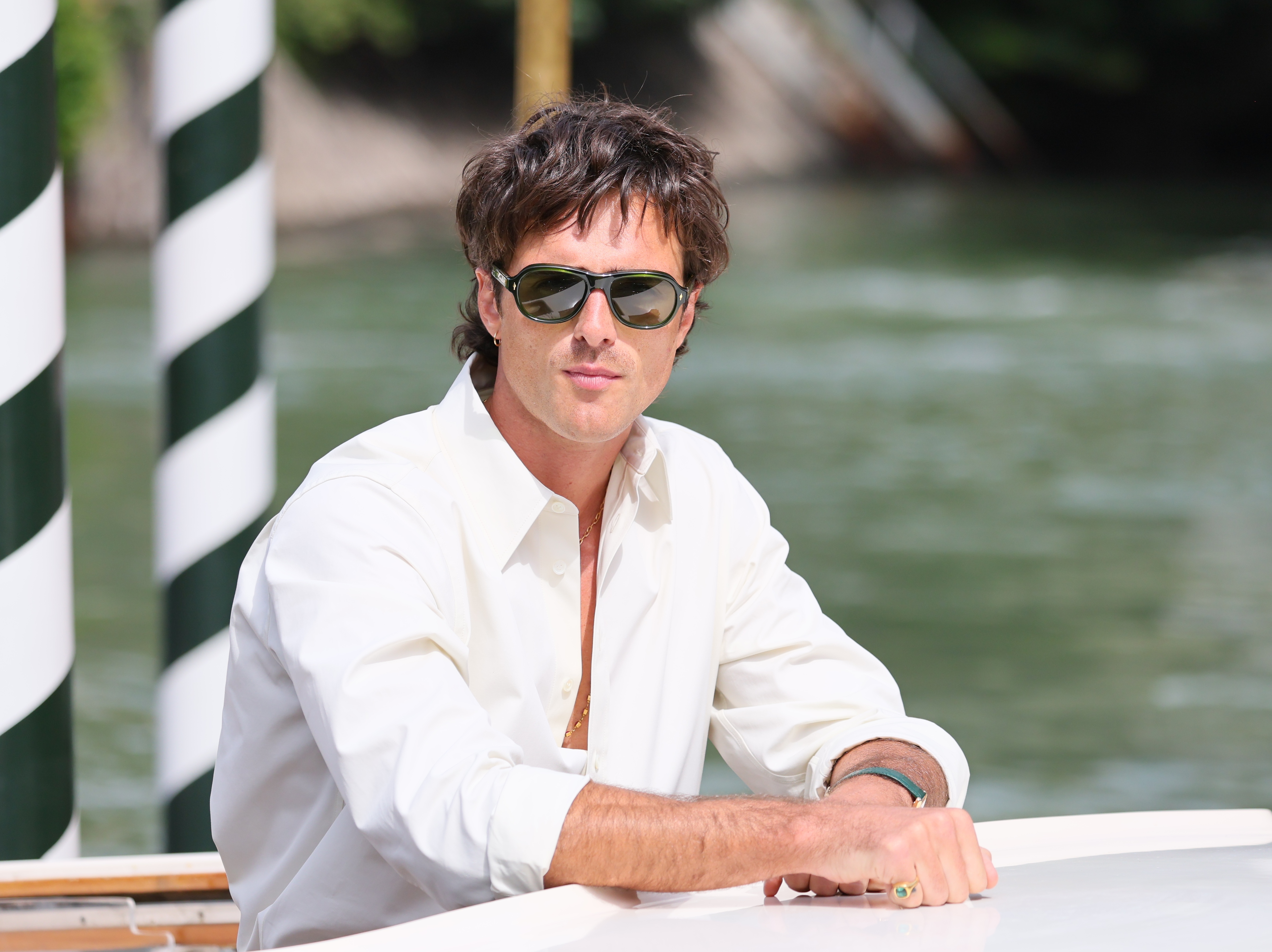 Jacob Eldori in white on a water taxi. 