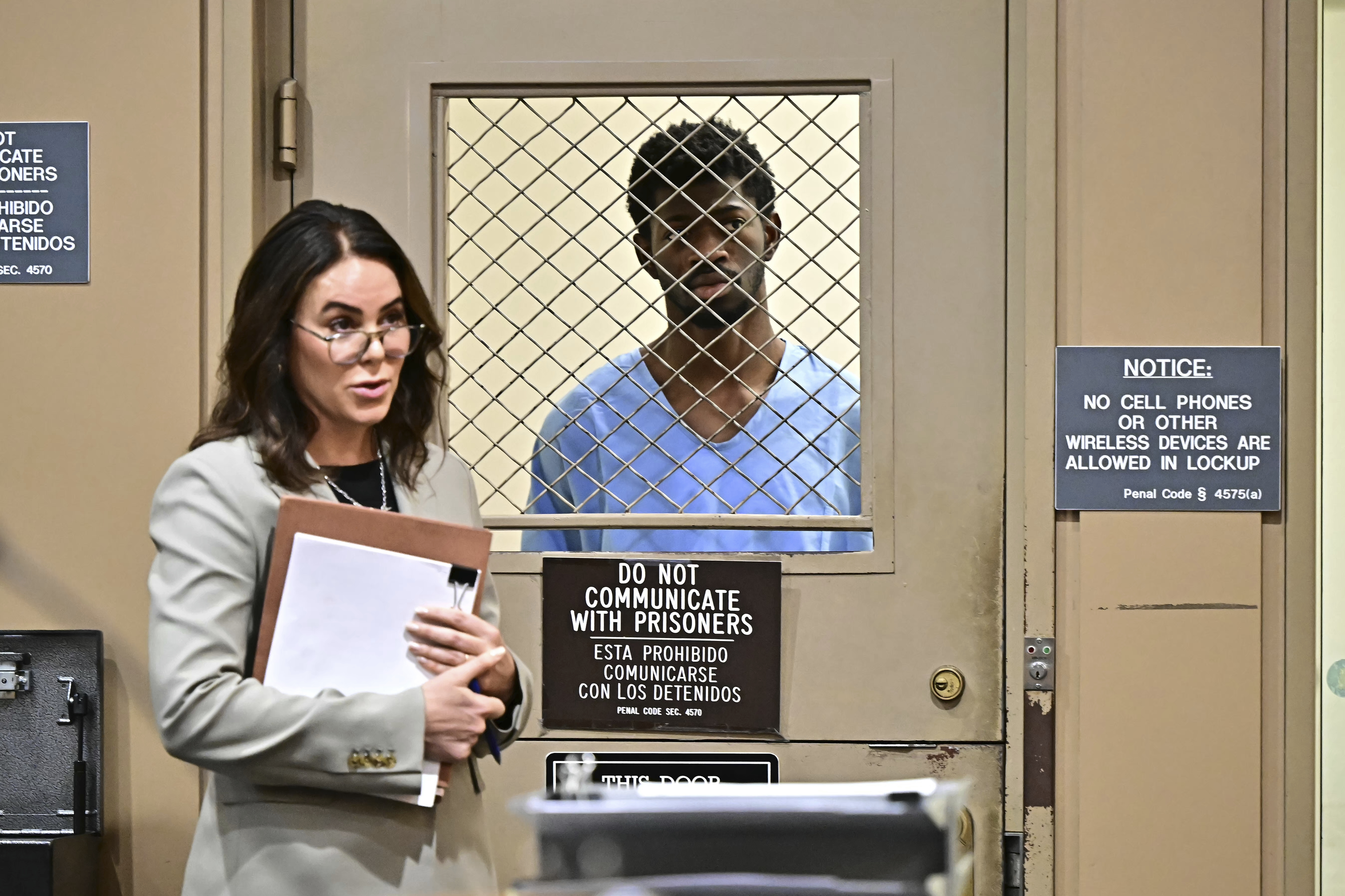 Lil Nas X behind bars in court. 
