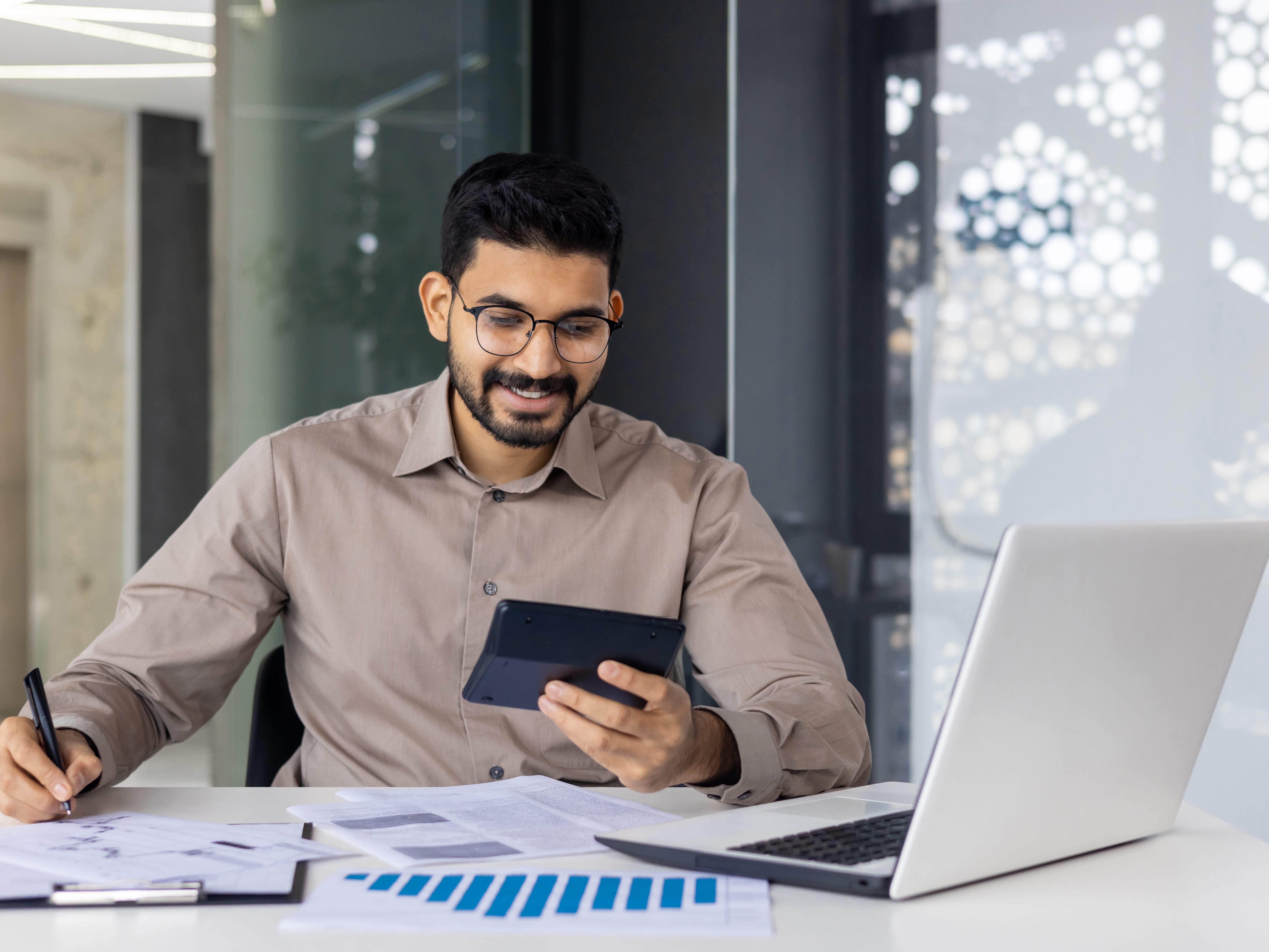 A person using a calculator