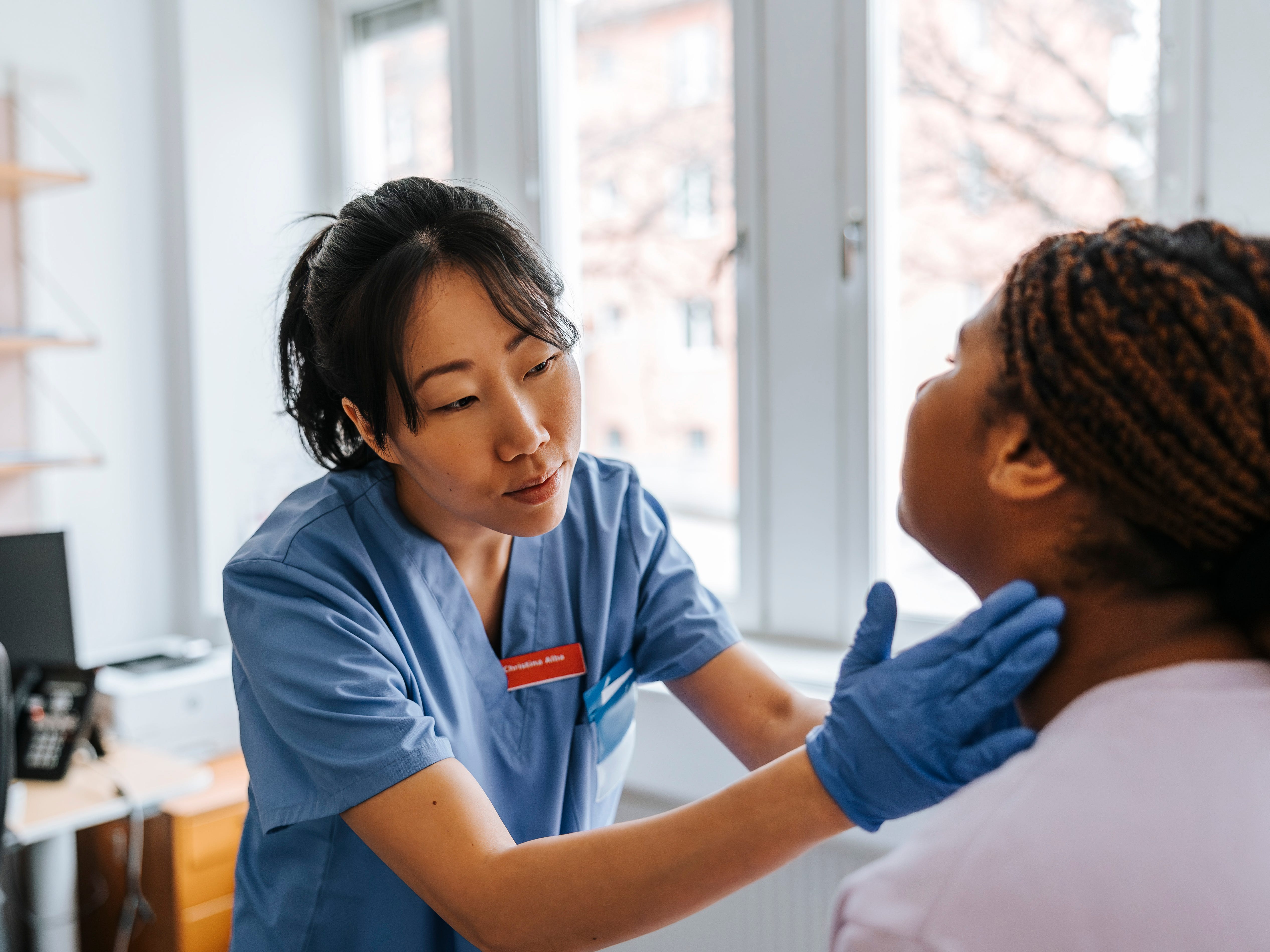 Healthcare worker with a patient