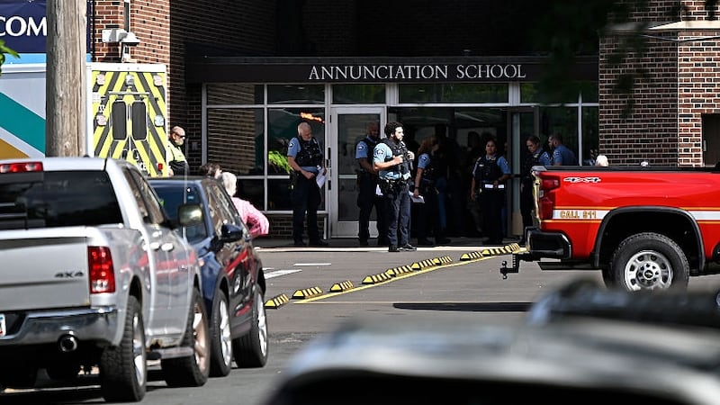 Police work the scene following a mass shooting at Annunciation Catholic School on August 27, 2025 in Minneapolis, Minnesota. According to Minneapolis Police, a gunman fired through the windows of the Annunciation Church at worshippers sitting in pews during a Catholic school Mass, killing two children and injuring at least 17 others. The gunman reportedly died at the scene from a self-inflicted gunshot wound. (Photo by Stephen Maturen/Getty Images)