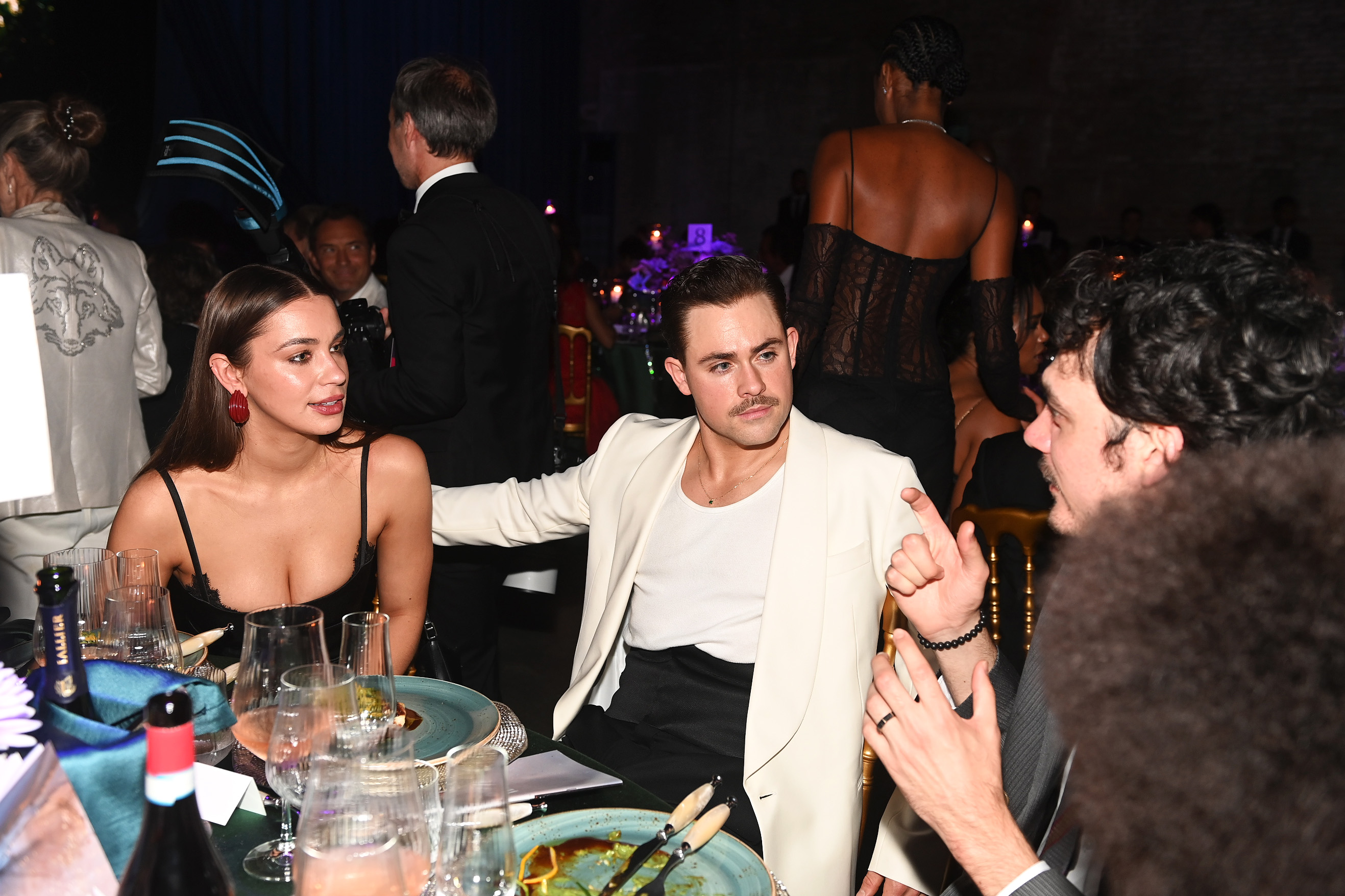 Dacre Montgomery and Liv Pollock attend the amfAR Gala Venezia 2025 presented by World Gold Council