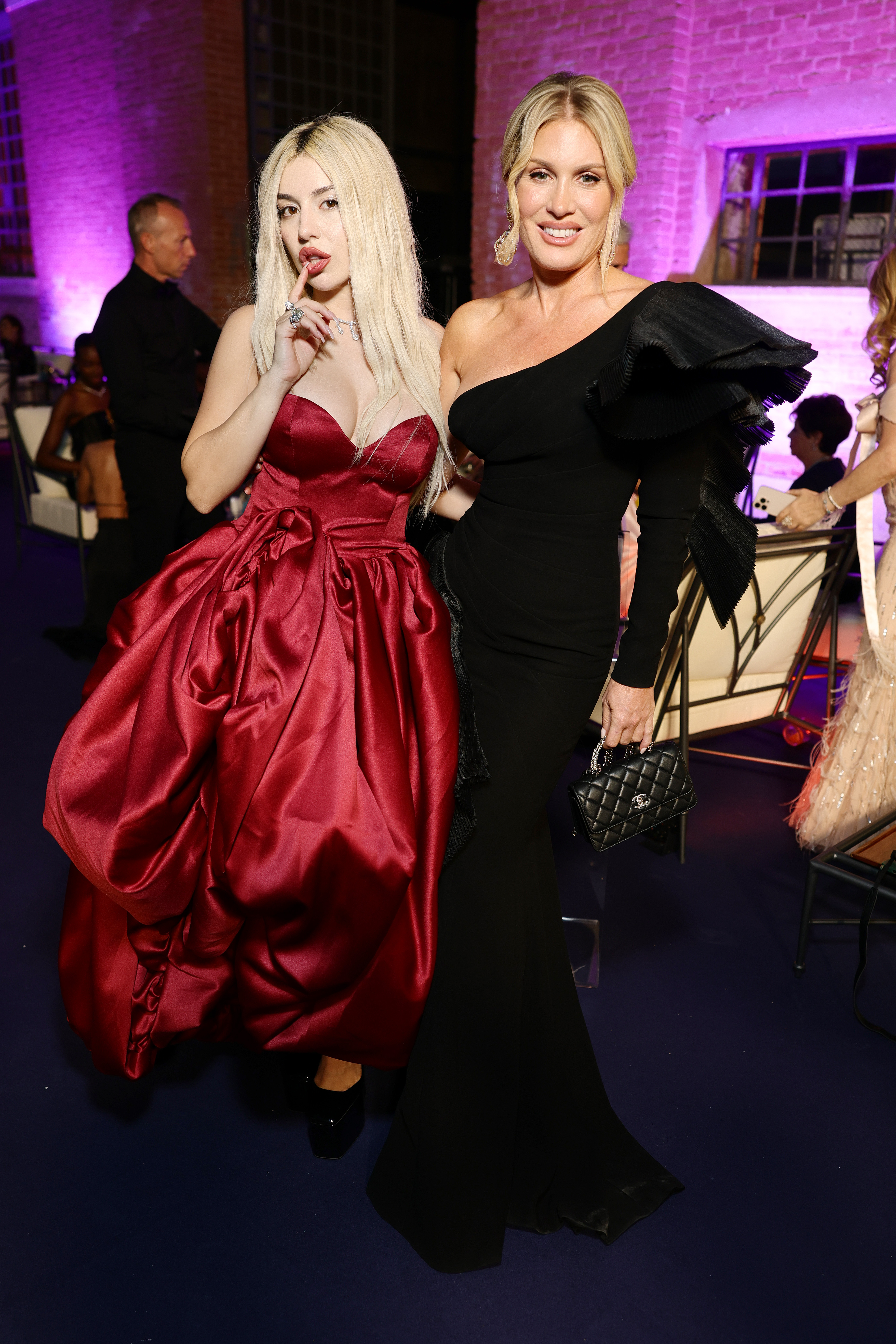 Ava Max and Hofit Golan attend the amfAR Gala Venezia 2025 presented by World Gold Council