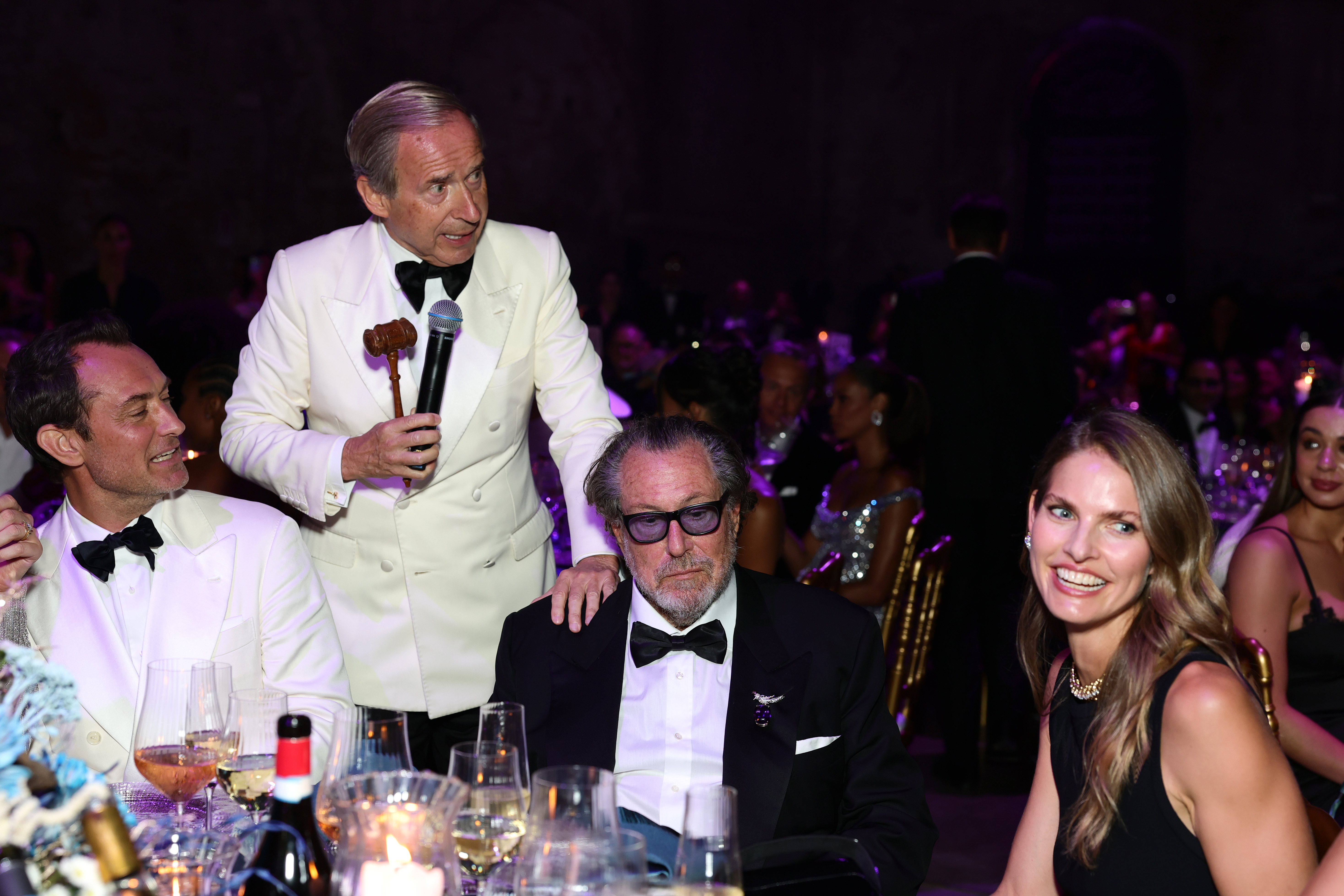 Jude Law, Simon de Pury, Julian Schabel, and Louise Kugelberg attend the amfAR Gala Venezia 2025 presented by World Gold Council