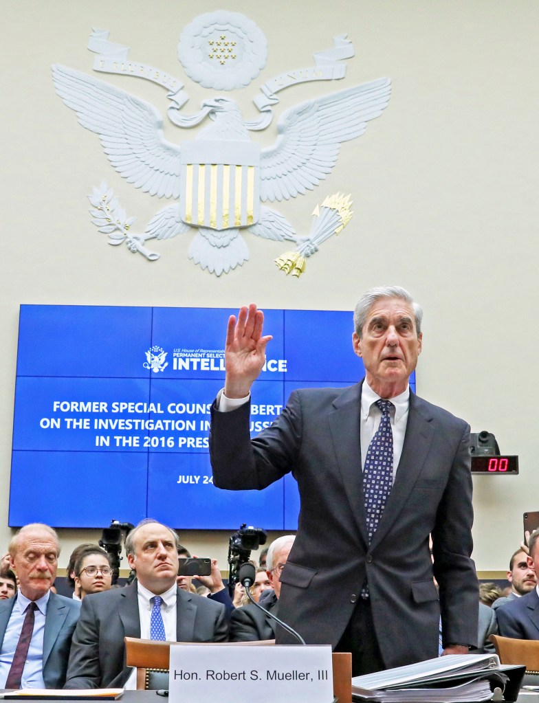 Mueller is sworn in to testify before a House Intelligence Committee hearing on the Office of Special Counsel's investigation into Russian Interference in the 2016 Presidential Election on Capitol Hill in Washington, U.S., July 24, 2019.
