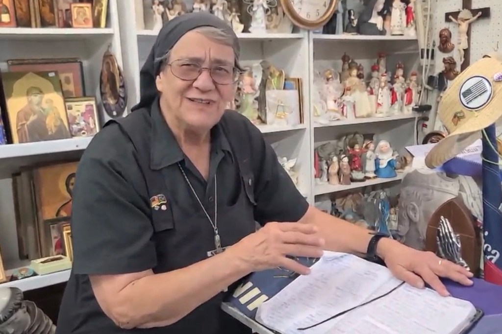 Sister Mary Madalyn Schleifer reviewing documents.