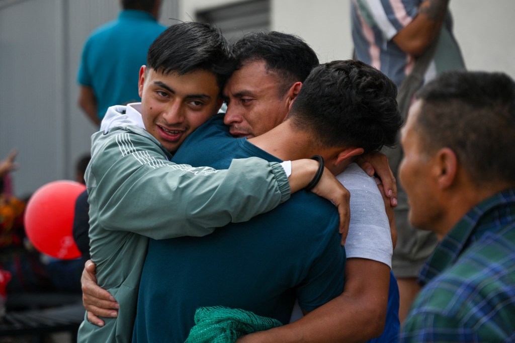 A Guatemalan migrant reunited with family after deportation from the United States.