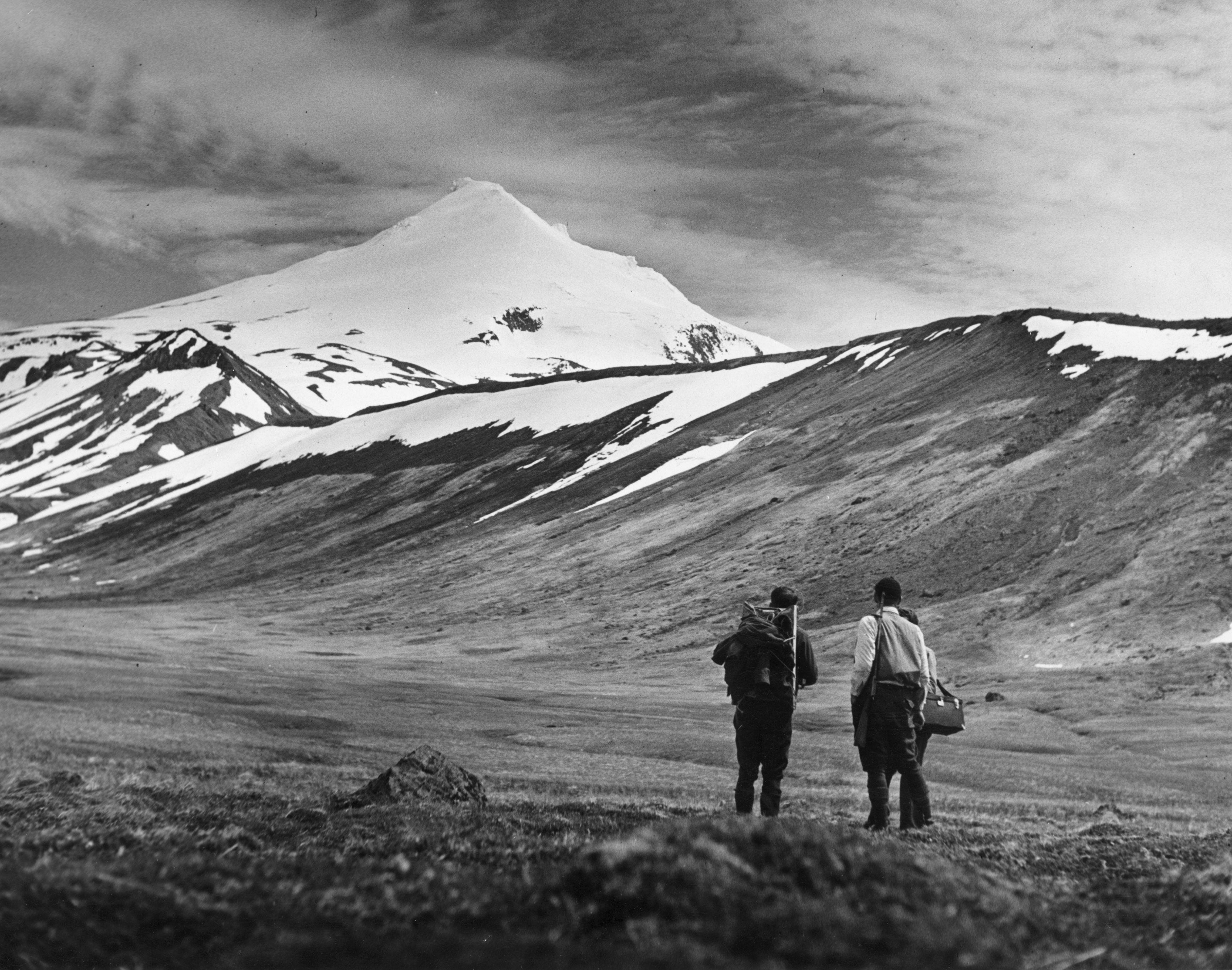 circa 1950: A typical scene of the Aleutian Islands with a volcanic cone in the background
