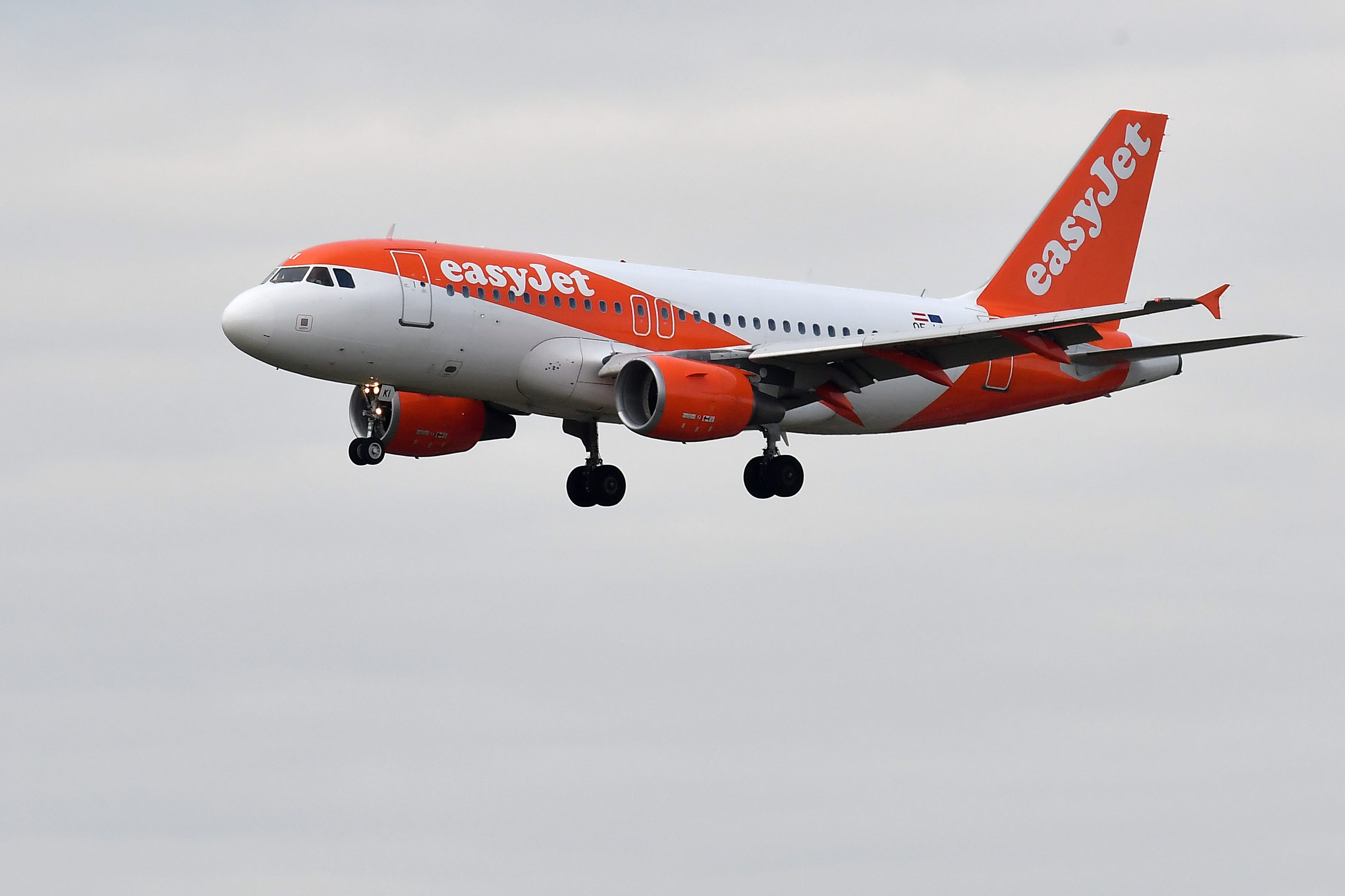 Airbus A319 easyjet landing on the runway at Leonardo da Vinci airport. Fiumicino (Italy), November 9th, 2022