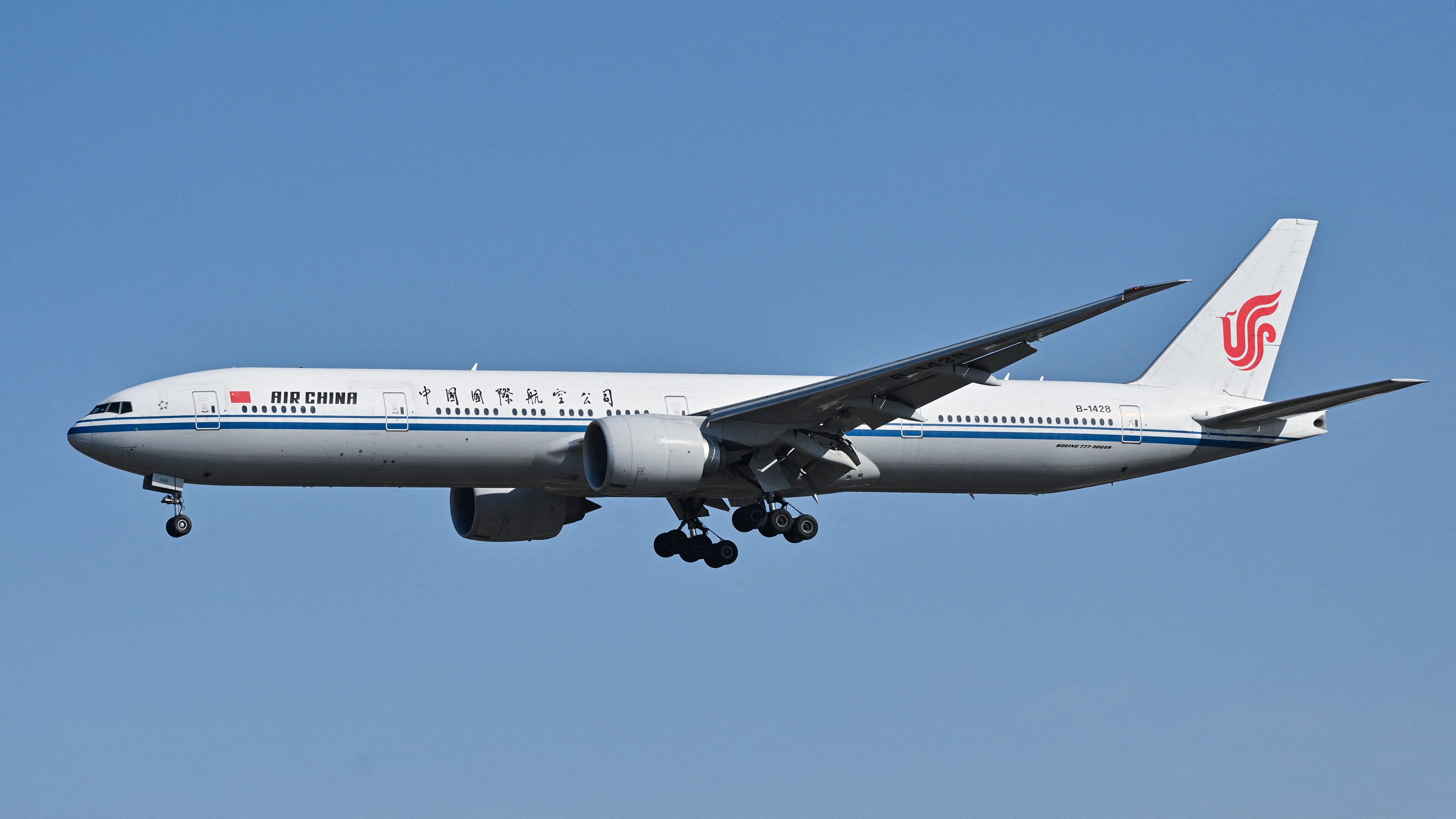 An Air China Boeing 777-300 ER plane prepares for landing at the Capital International airport in Beijing on October 22, 2024.
