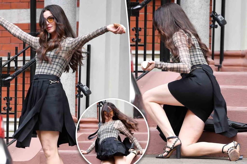 Anne Hathaway takes a tumble on a broken shoe while filming ‘The Devil Wears Prada 2’