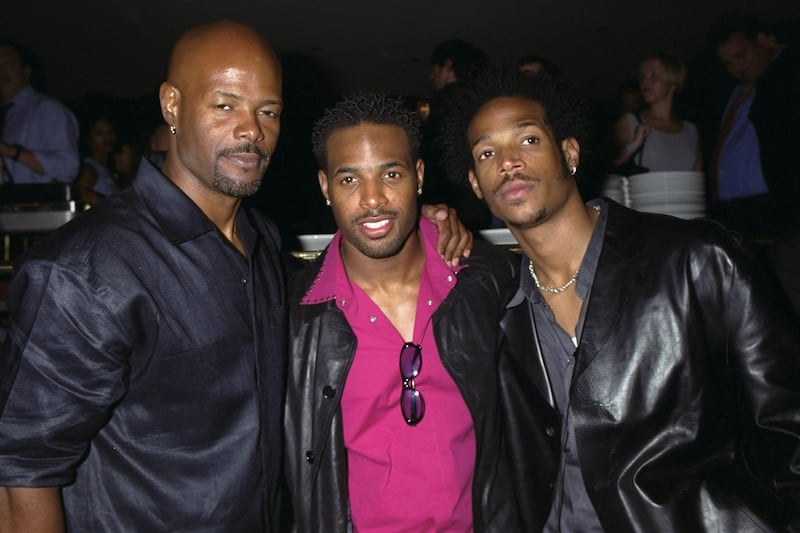 Keenen Ivory Wayans (L) wrote and directed the first two films, while Marlon (R) and Shawn Wayans (middle) wrote and starred in the first two films.