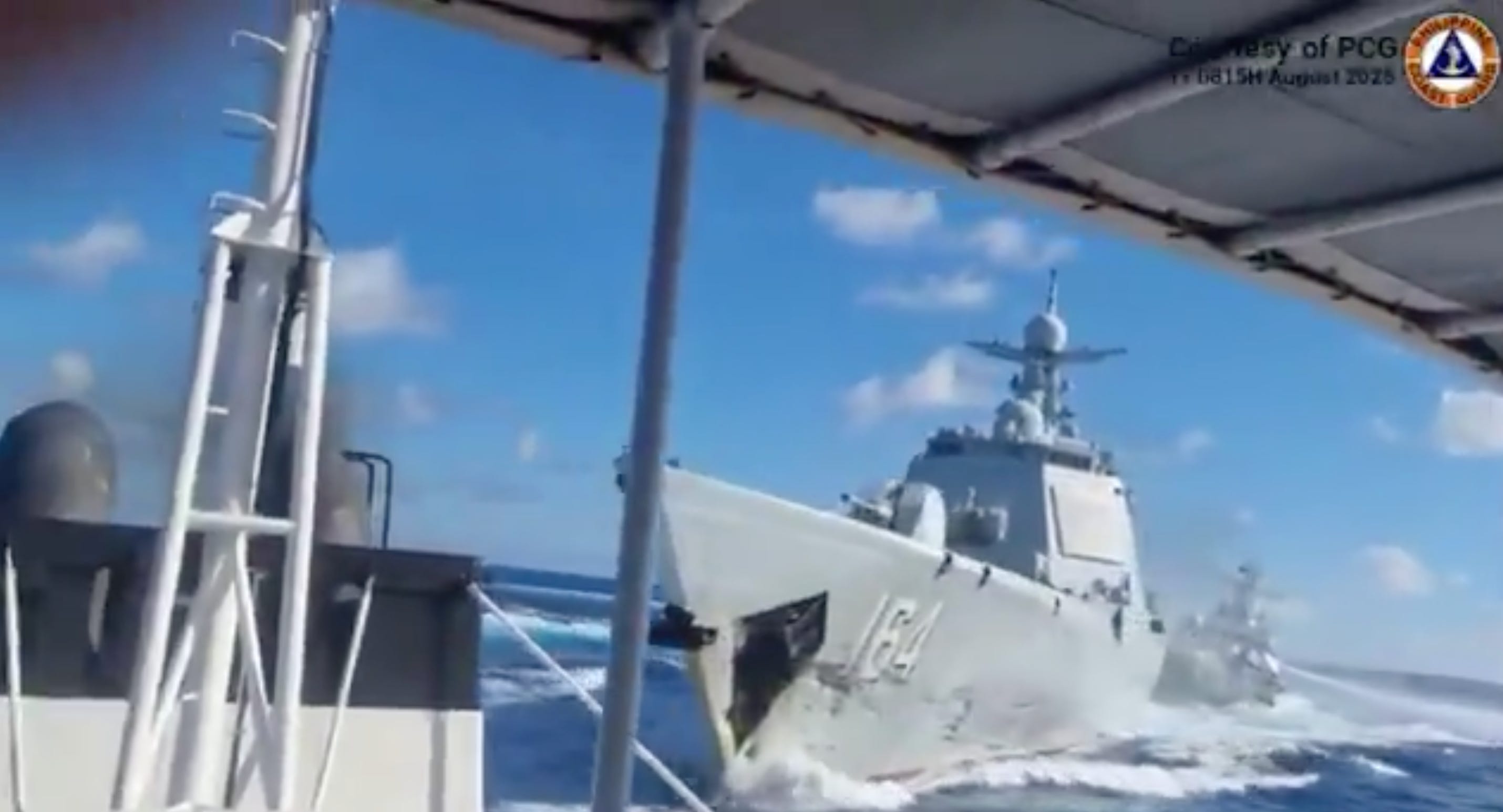 A screenshot of a video showing a Chinese Coast Guard vessel damaged after a collision with a Chinese Navy ship.