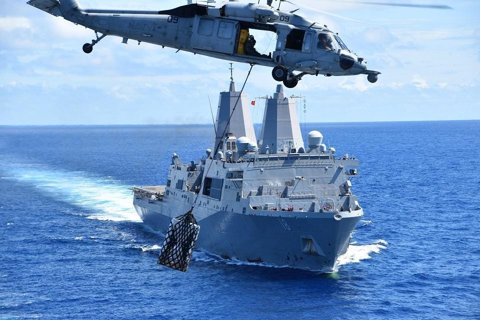 Navy amphibious transport dock ship USS New Orleans underway replenishment