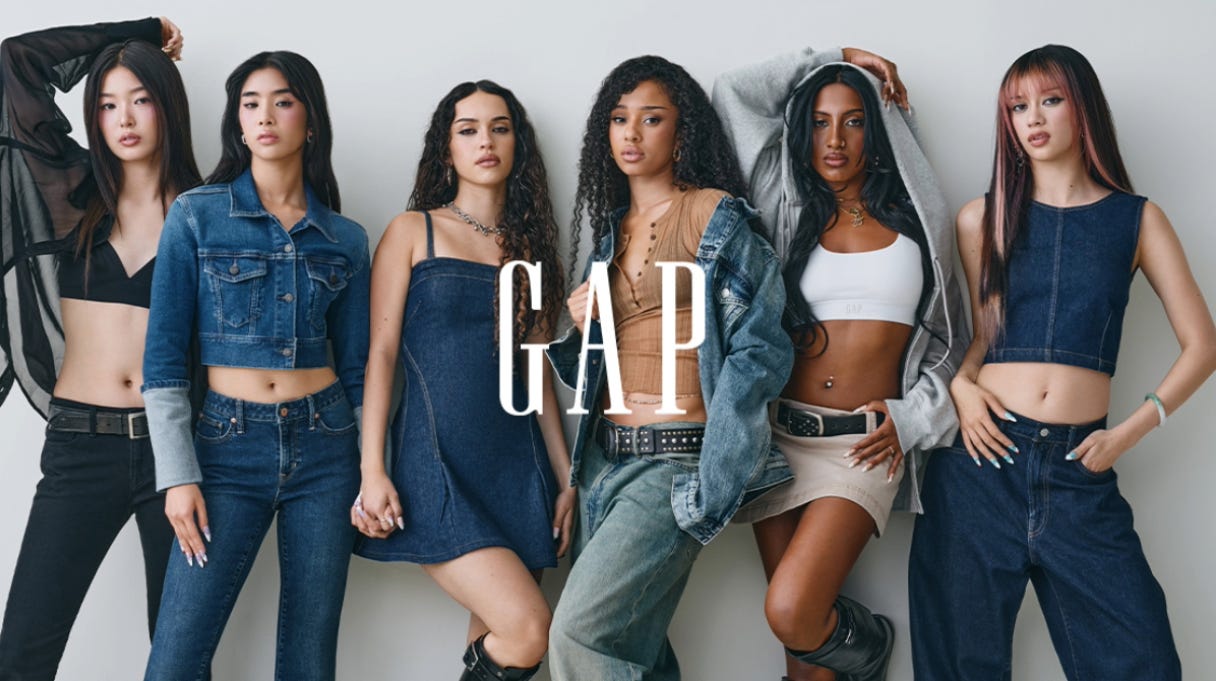 Katseye group behind a Gap logo