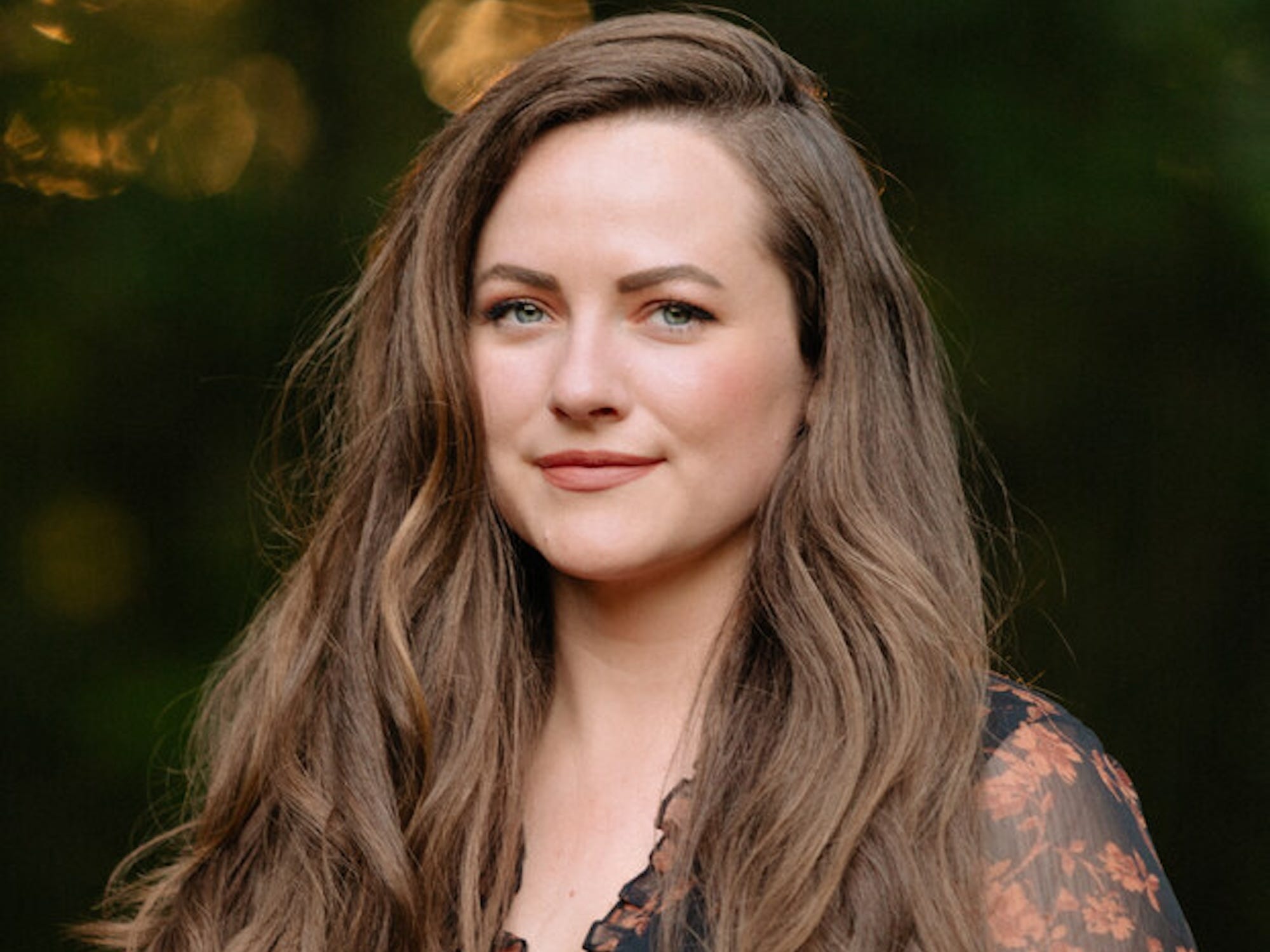 A headshot of Rebecca Ross.