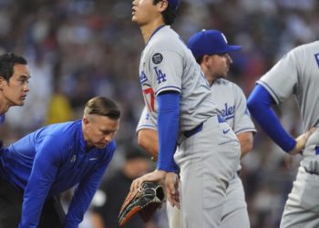 Dodgers’ Ohtani roughed up by Rockies and leaves game after getting hit on knee by line drive