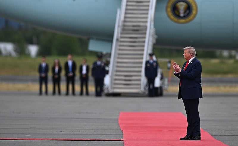 ALASKA, US - AUGUST 15 : (----EDITORIAL USE ONLY - MANDATORY CREDIT - ' KREMLIN PRESS OFFICE / HANDOUT' - NO MARKETING NO ADVERTISING CAMPAIGNS - DISTRIBUTED AS A SERVICE TO CLIENTS----) President Donald Trump meets his Russian counterpart, Vladimir Putin on the tarmac in a red-carpet greeting after the Russian presidential plane touched down in Anchorage, Alaska, United States on August 15, 2025. President Donald Trump and his Russian counterpart, Vladimir Putin, begin critical talks in Alaska Friday, aimed at bringing an end to the Kremlin's over-three-year war on Ukraine. (Photo by Kremlin Press Office / Handout/Anadolu via Getty Images)