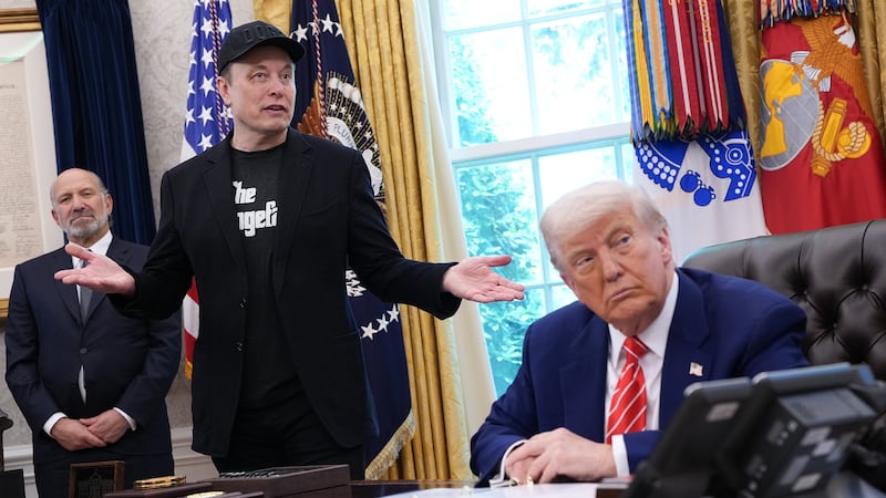 Tesla CEO Elon Musk speaks alongside U.S. President Donald Trump to reporters in the Oval Office of the White House on May 30, 2025 in Washington, DC. Musk, who served as an adviser to Trump and led the Department of Government Efficiency, announced he would leave his role in the Trump administration to refocus on his businesses.