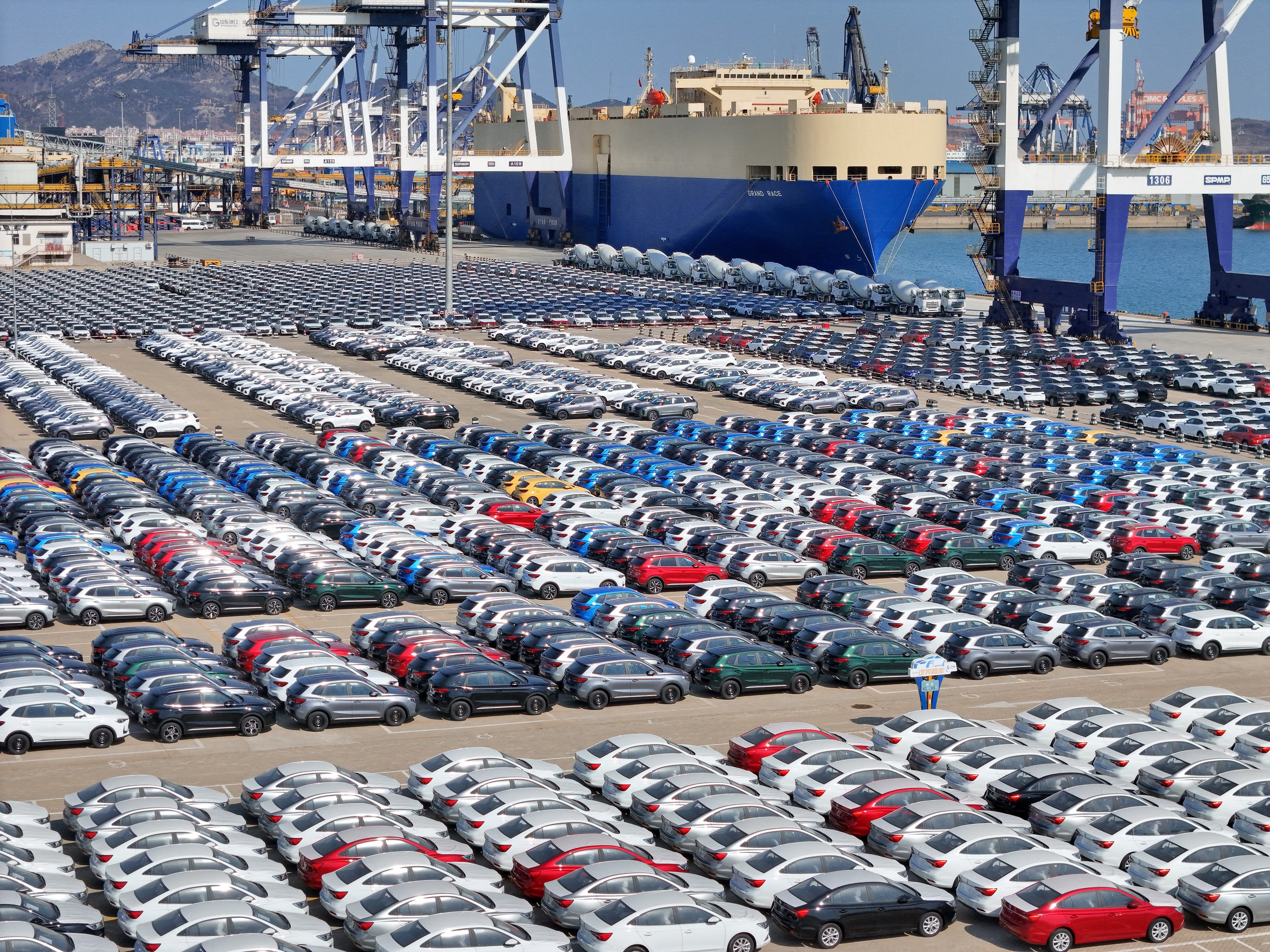 Cars for export at a port in Yantai, China's eastern province of Shandong on February 20, 2025.