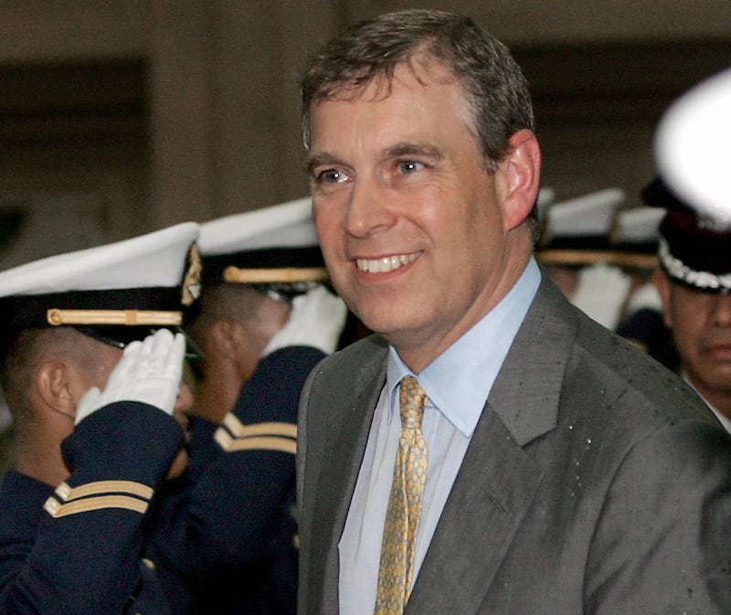 Bangkok, THAILAND: Britain's Prince Andrew arrives at a military airport in Bangkok, 07 June 2006. Prince Andrew is here to attend King Bhumibol's 60th anniversary of coming to the throne. AFP PHOTO/PORNCHAI KITTIWONGSAKUL (Photo credit should read PORNCHAI KITTIWONGSAKUL/AFP via Getty Images)