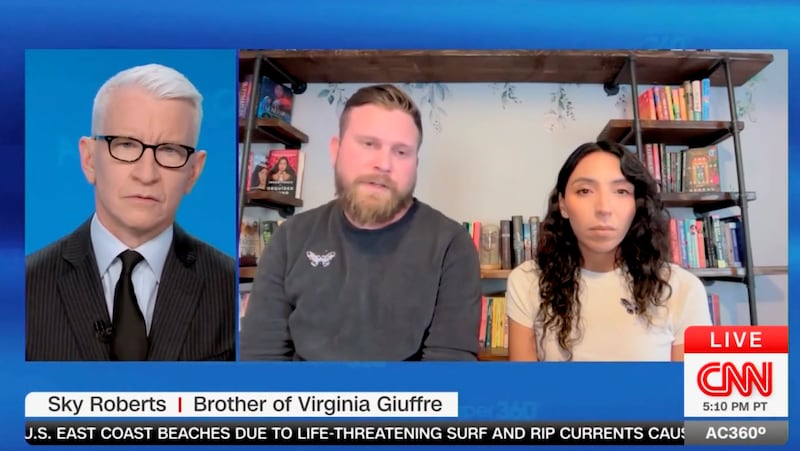 Sky and Amanda Roberts and Anderson Cooper