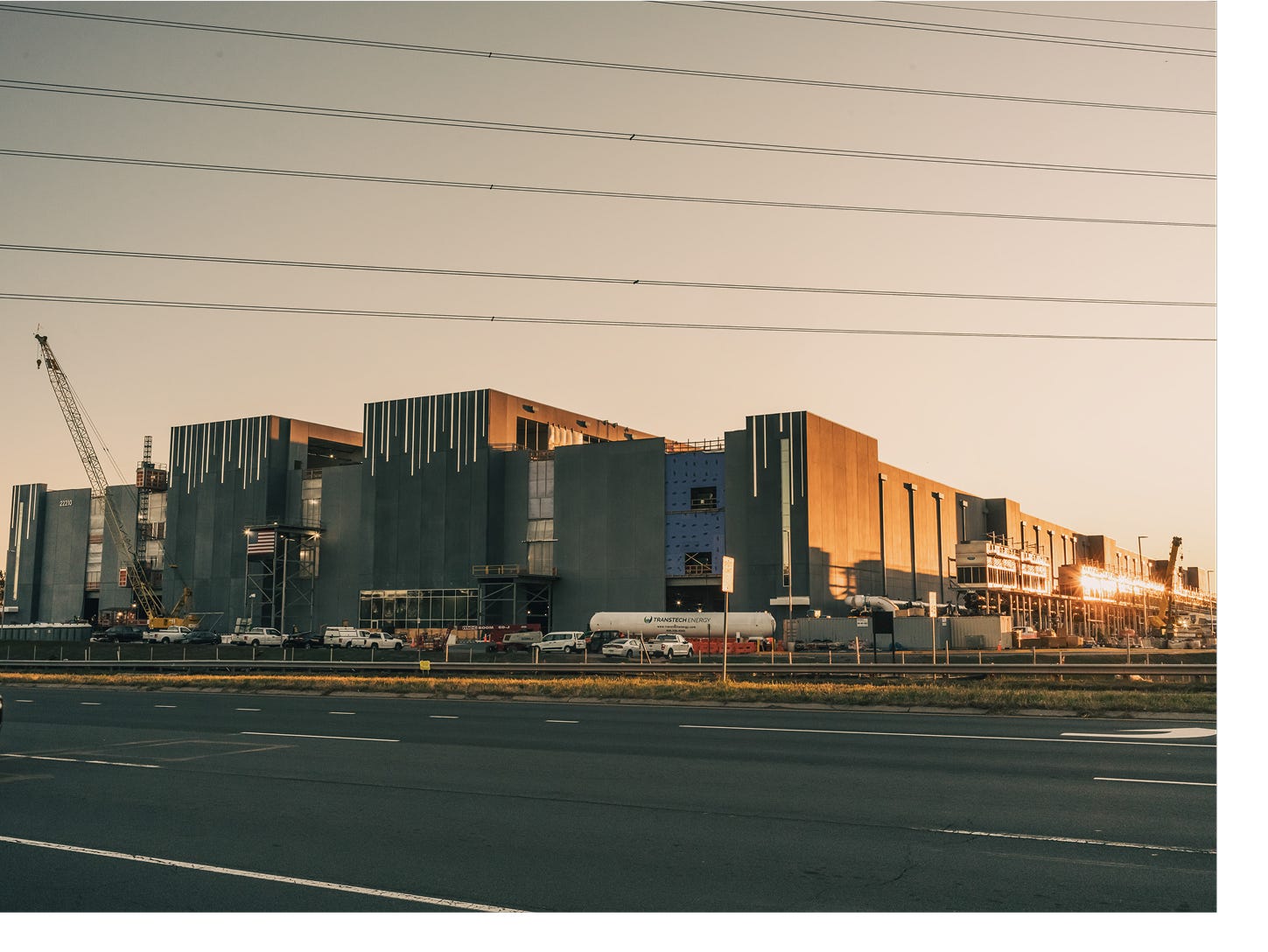 sun setting on a large data center