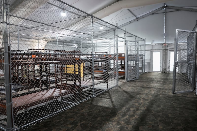 Each tent at Alligator Alcatraz has eight large cages, which hold 35 to 38 inmates. An ex-guard said that water “pours” into the tents during storms.