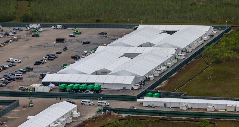Aerial view of Alligator Alcatraz’s white tents. The Florida Everglades surrounds the facility on all sides.