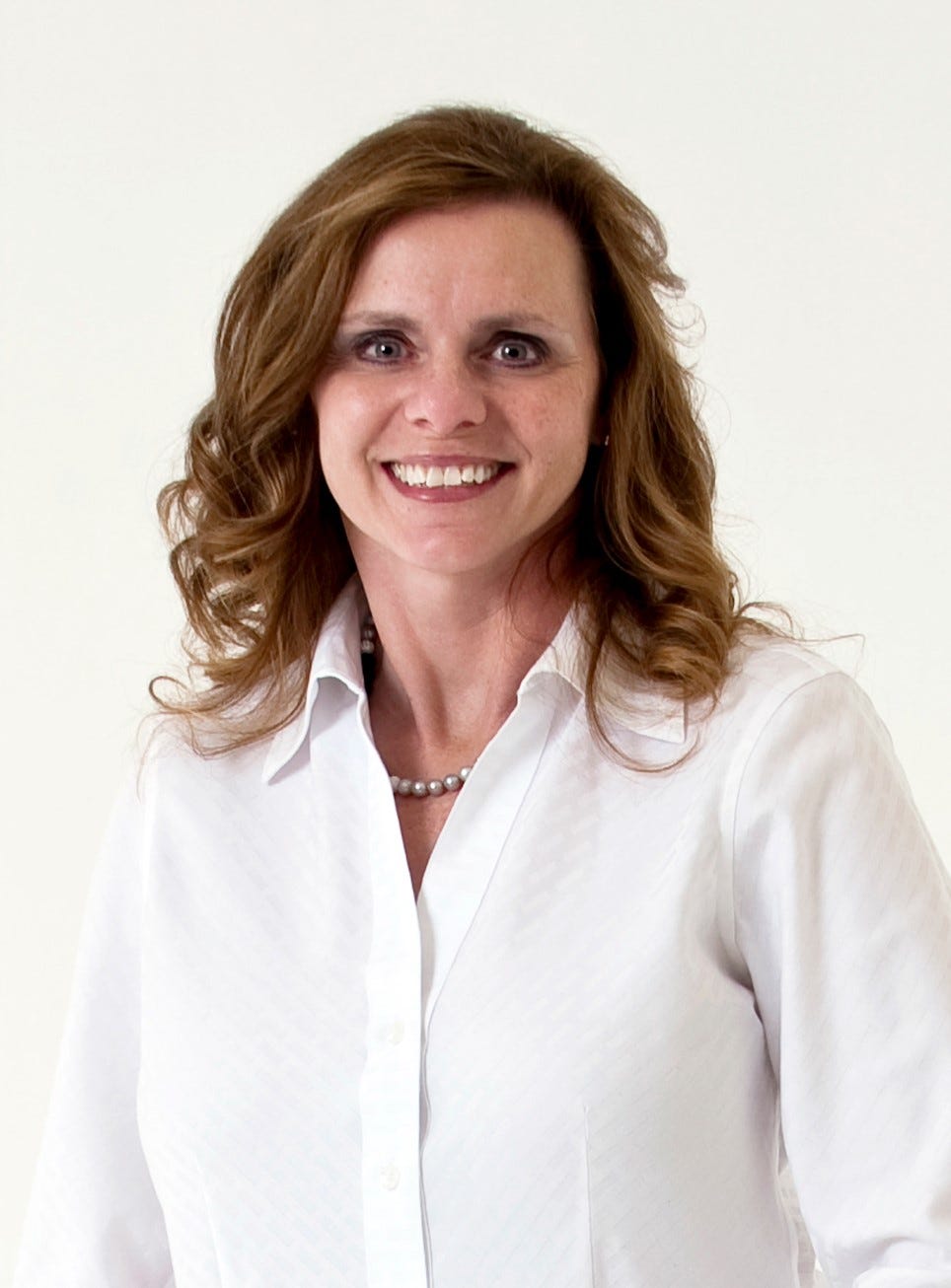 A headshot of a woman.