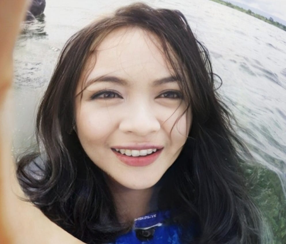 woman selfie swimming in water