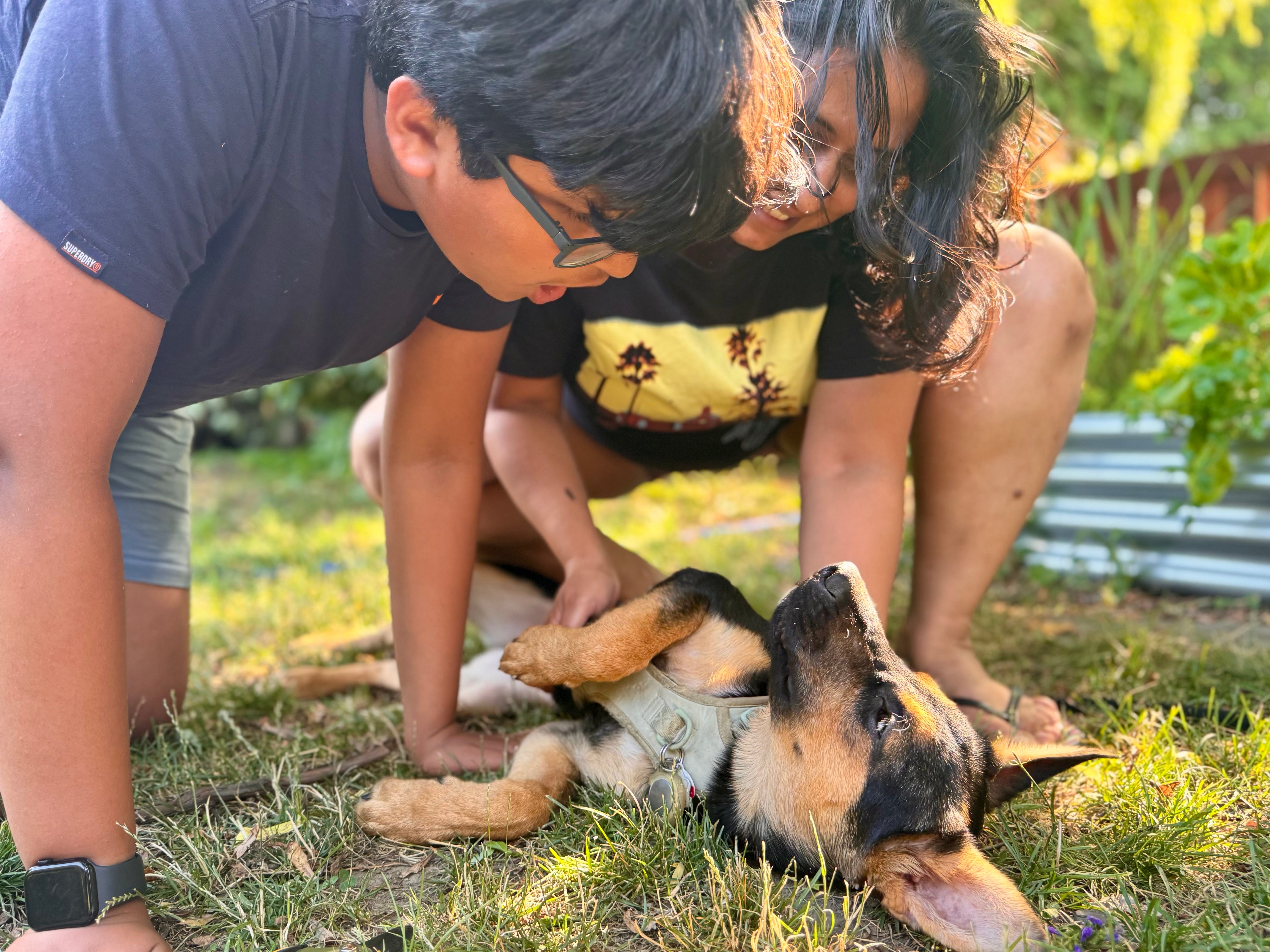 The author and her son with the puppy the fostered.